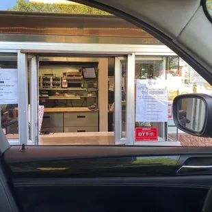 Pick up window, wide enough to see the staff working inside , I did and saw no one waring gloves and masks