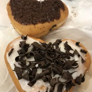  two donuts with chocolate sprinkles