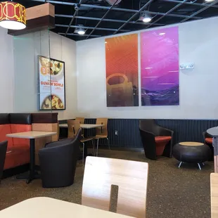  the interior of a dunkin donuts restaurant