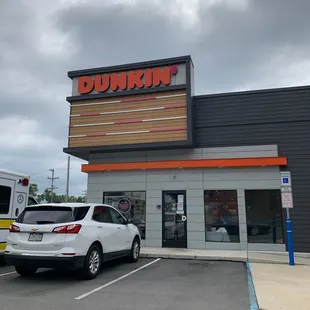  the outside of a dunkin'donuts store