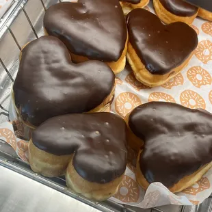  chocolate covered donuts in a basket