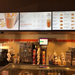  menus and drinks at a fast food restaurant