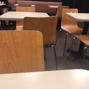 Tables and chairs in the Dunkin'