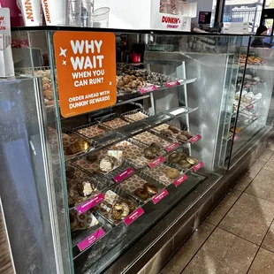  a display of donuts in a donut shop