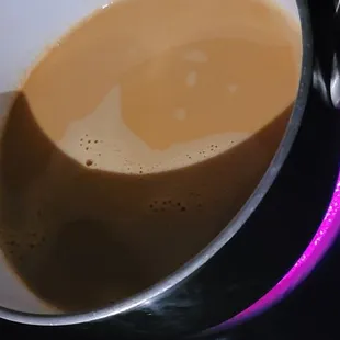 My lukewarm coffee that I took home and had to heat up.