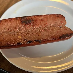 a hot dog on a plate