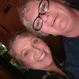 two women smiling for the camera