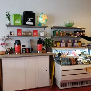 a woman standing in front of the counter