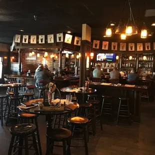 a man standing at the bar