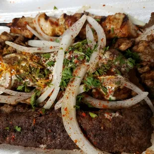 Mixed grill meat over basmati rice