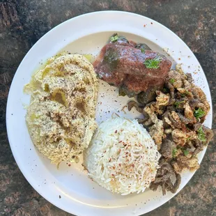 Mixed Mix Meat Grill On Basmati Rice with sides Hummus and Grape Leaves