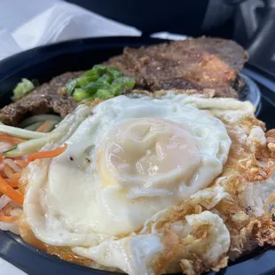 Rice with pork chops and fish sauce!! My new favorite spot