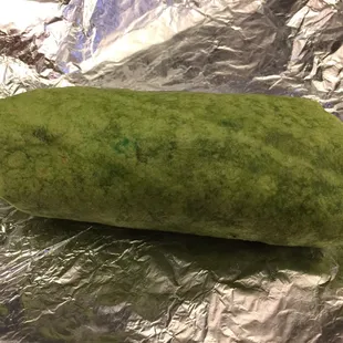 Breakfast burrito with spinach tortilla