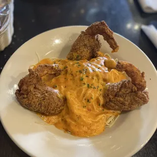 Stuffed Shrimp over angel hair pasta, with Roasted Red Pepper cream sauce.