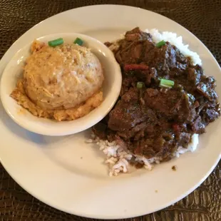 Smothered ribeye over rice lunch special.