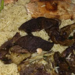 Salmon and goat with rice for family of 4. Meat is a bit dry. Big portion of rice. Total $24