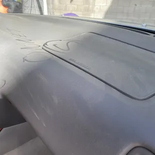 Front dash dirty due to the windows being open for a month