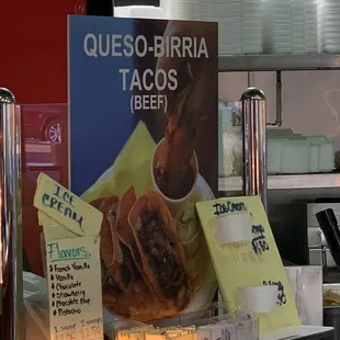 a sign for a taco shop