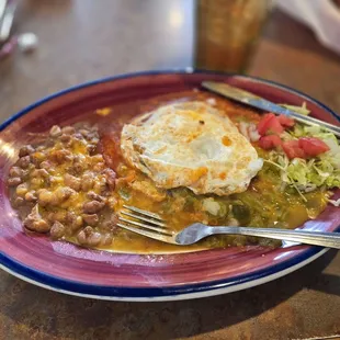 Blue corn cheese enchiladas with an over easy egg.