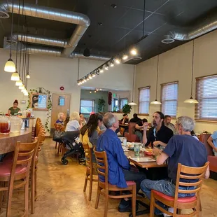 a group of people sitting at a table