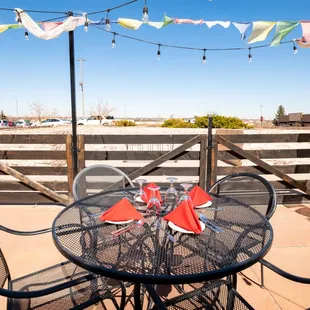 a table and chairs on a patio