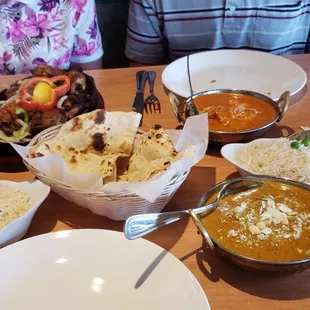 Lamb korma, chicken tikka masala, tandoori chicken, naan