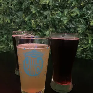 two glasses of beer on a table