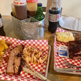 Brisket, pulled chicken, ribs, and sides