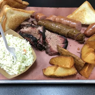 2-meat combo with brisket and sausage. Sides of coleslaw and potato wedges.