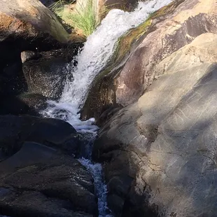 Steps from our room-creek/pond/falls and boulders even kids can scramble up. Our kids loved it.