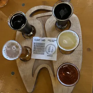 four beers on a cutting board