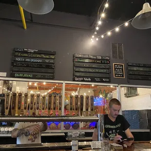 a man working behind the counter