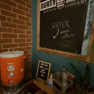 a beer keg and a sign