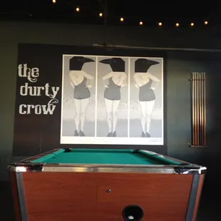 a pool table in a bar