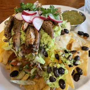 Pork nachos with on a Tuesday.