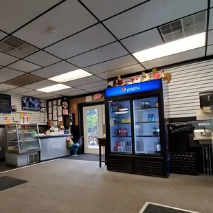 Why are the stuffed animal chickens on top of the beverage cooler?