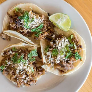 Try our house smoked pork tacos!