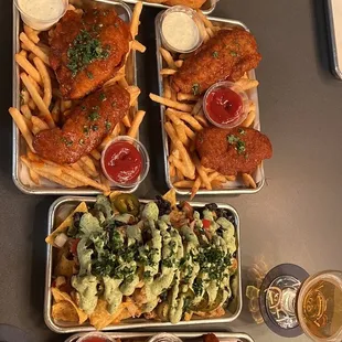 Onion rings, nachos, chicken sandwich and chicken strips