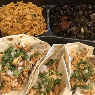 three tacos and rice