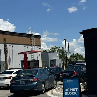 There are two other buildings under construction your best entrance is through Scarlet Rd