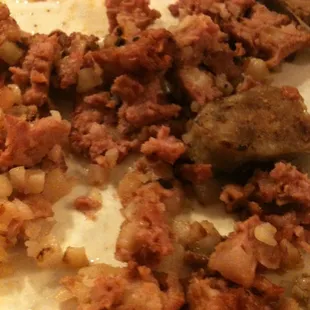 Corn beef hash and buck link sausage (right)