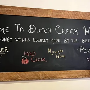 a blackboard with a list of wines