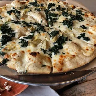 Spinach and artichoke pizza