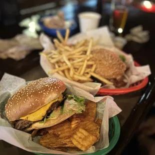 a hamburger and fries on a table