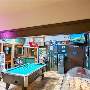 a pool table in a game room