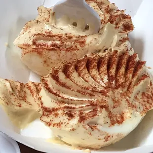 a plate of food with a spoon in it