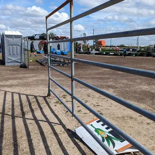 Discarded signs from what appears to be last fall litter the ground
