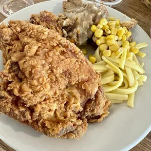 My plate fried chicken, noodles, corn, and dressing