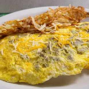 Excellent Sausage &amp; Cheese Omelet with perfectly crispy Hash Browns and an unseen biscuit!