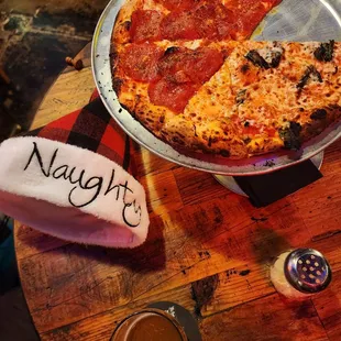 a pepperoni pizza with a slice missing